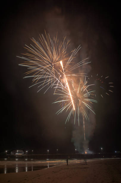 istock Fireworks explode over Newport Pier in Newport Beach, CA 1086053410