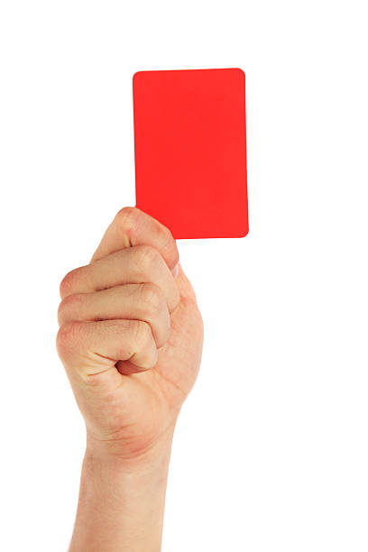 Human hand holding red card stock photo