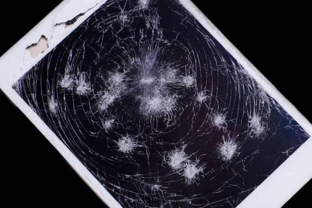 istock Tablet cracked screen damaged shattered and smashed broken not operating view from above insurance claim 1086062032
