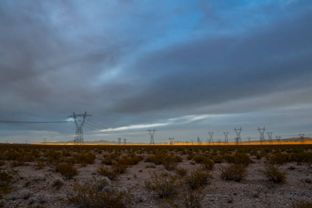 istock High Voltage Pylons on desert landscape 1086062350