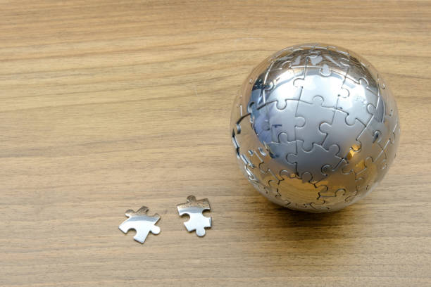quebra-cabeça do globo - solution silver problems puzzle - fotografias e filmes do acervo