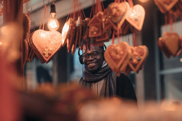 Young African man enjoy shopping Christmas gifts.