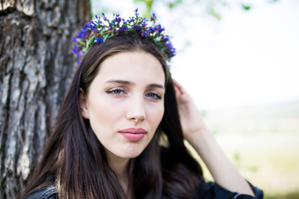 istock female model photography between flowers 1086073140