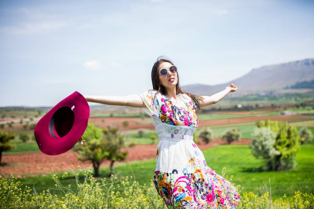 istock female model photography between flowers 1086073162
