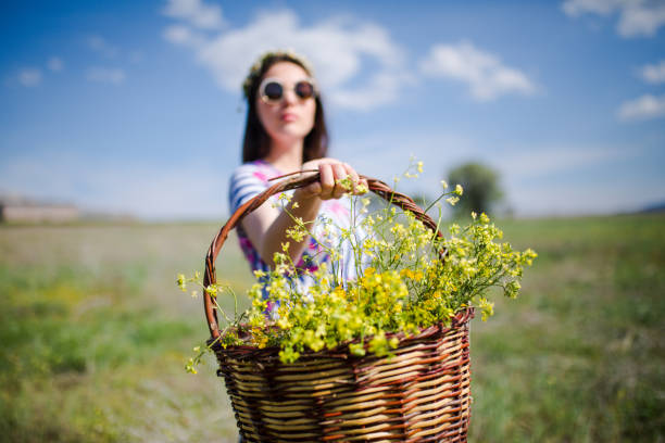 female model photography between flowers
