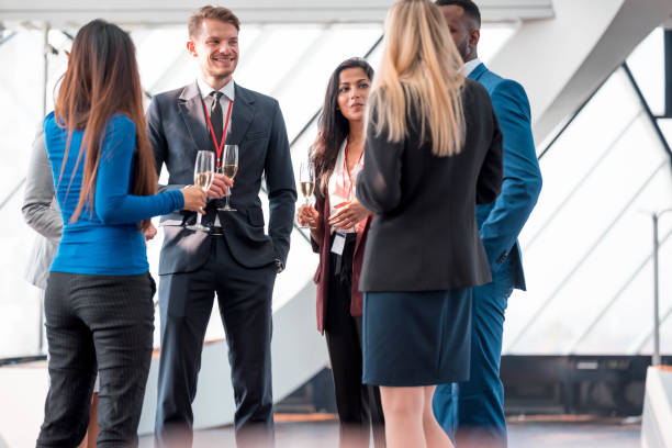 istock Businesspeople celebrating with champagne 1086073194