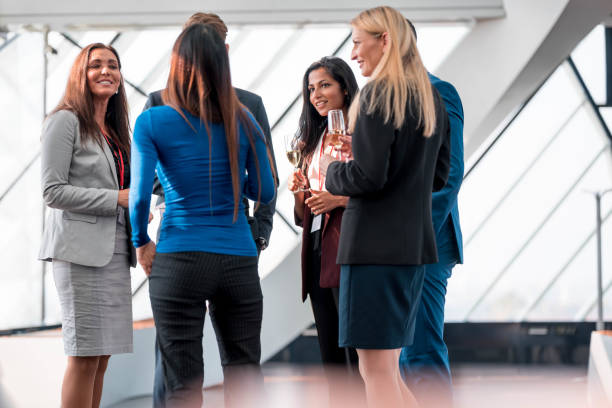 istock Businesspeople celebrating with champagne 1086073198