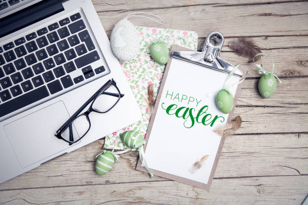 istock High Angle View Of Laptop With Personal Accessories On Table During Easter 1086073500