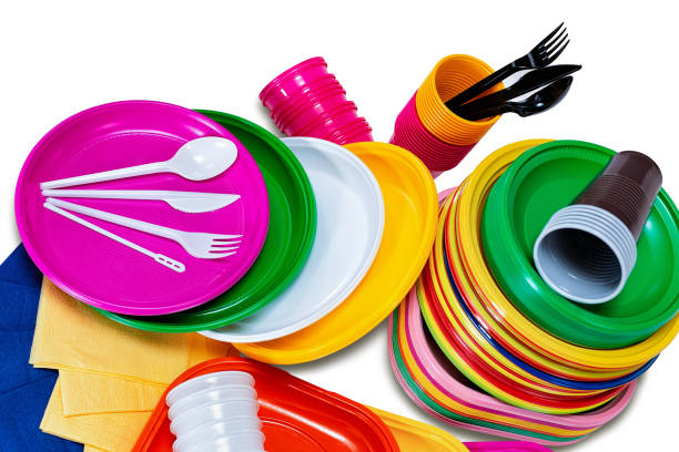 istock Plastic disposable tableware and plates with cutlery picnic 1086084760