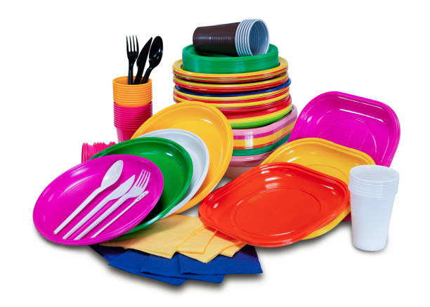 istock Plastic disposable tableware with plates and cutlery picnic 1086084780