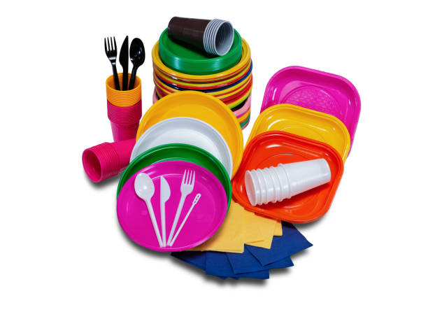 istock Set of plastic disposable tableware with plates and cutlery picnic 1086084992