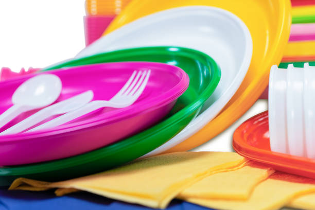 istock Set of plastic disposable tableware with plates cutlery picnic 1086085034