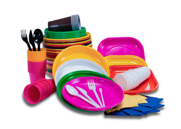 istock Set with plastic disposable tableware with plates and cutlery picnic 1086085104