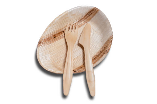 istock Wooden disposable tableware with plate and cutlery fork knife 1086085210