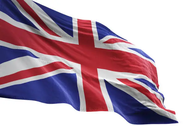 Photo of United Kingdom flag close-up waving isolated white background