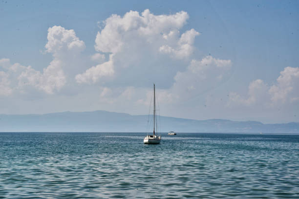 istock Sail boat on the middle of the lake 1086087708