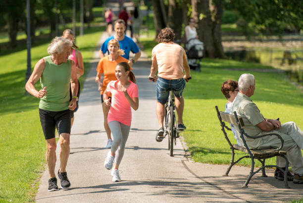 istock Family jogging in the park 1086088492