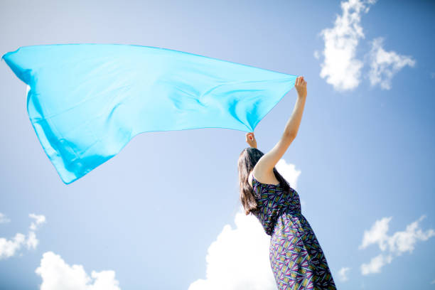 istock woman meditating in nature 1086089834