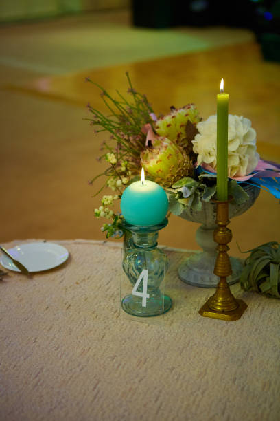 istock Elegant wedding guest table set for an event with candles lit 1086094964