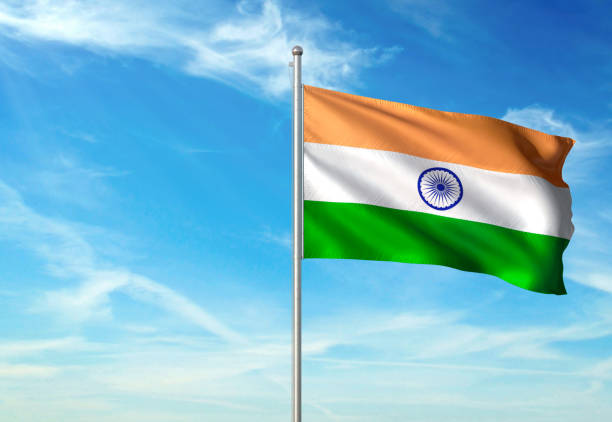 istock India flag waving cloudy sky background 1086106396
