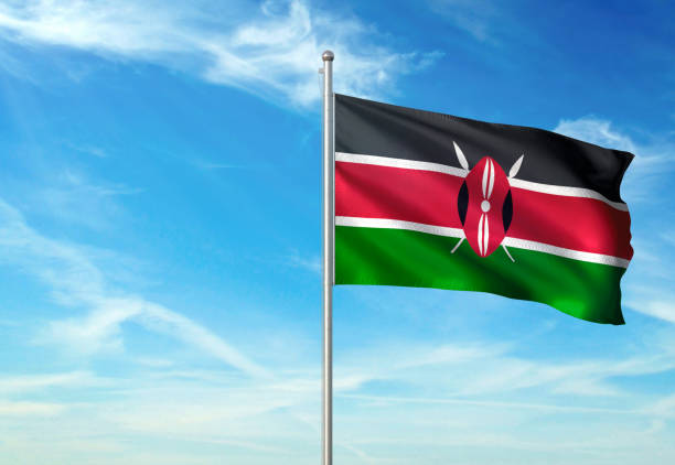 istock Kenya flag waving cloudy sky background 1086106418