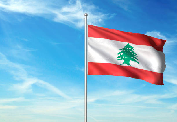 istock Lebanon flag waving cloudy sky background 1086106434