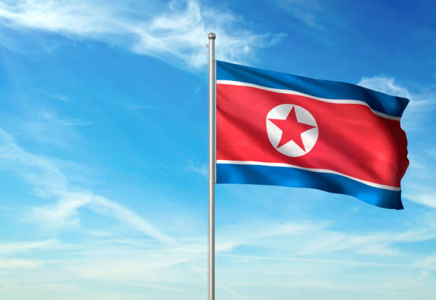 istock North Korea flag waving cloudy sky background 1086106530