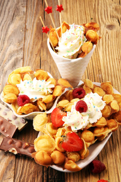 istock Hong Kong style egg waffle on wooden board. bubble waffle 1086109552