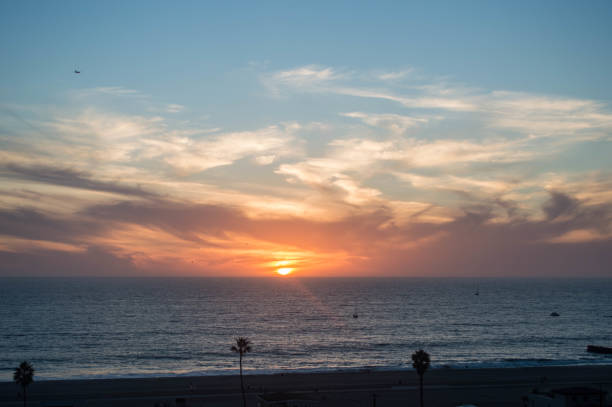 istock Sun sets over the Pacific Ocean in Playa del Rey, CA 1086118180