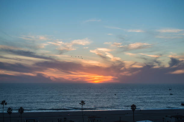 istock Sun sets over the Pacific Ocean in Playa del Rey, CA 1086118184