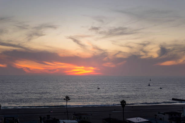 istock Sun sets over the Pacific Ocean in Playa del Rey, CA 1086118232