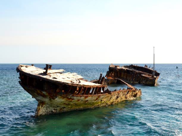 istock Rusting shipwreck used for diving as an artificial reef on Heron Island at Great Barrier Reef 1086119530