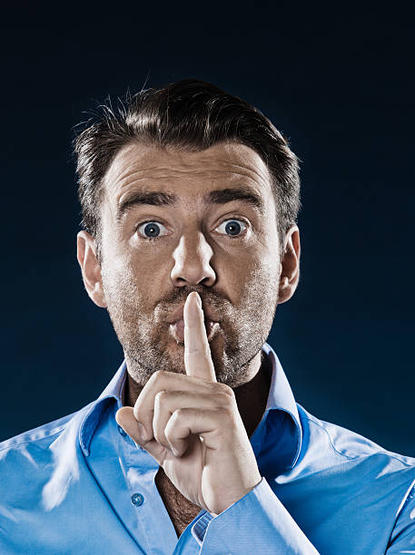 istock Man Portrait Hush Sign 108612414