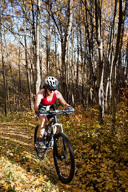 istock Woman mountain biking. 108612512