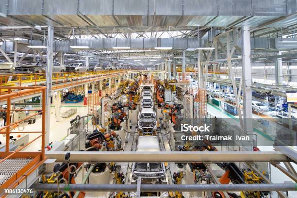 Body Of Car On Conveyor Modern Assembly Of Cars At Plant Automated Build Process Of Car Body Stock Photo - Download Image Now