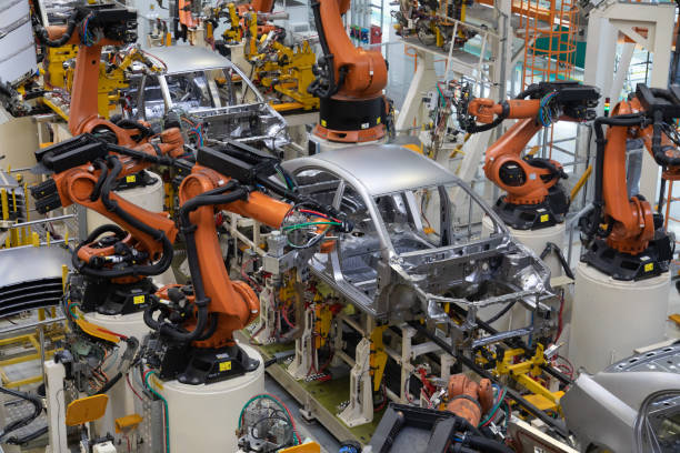 cuerpo del coche en la vista superior del transportador. moderno montaje de coches en la planta. el proceso de generación automatizada de la carrocería - fábrica de coches fotografías e imágenes de stock