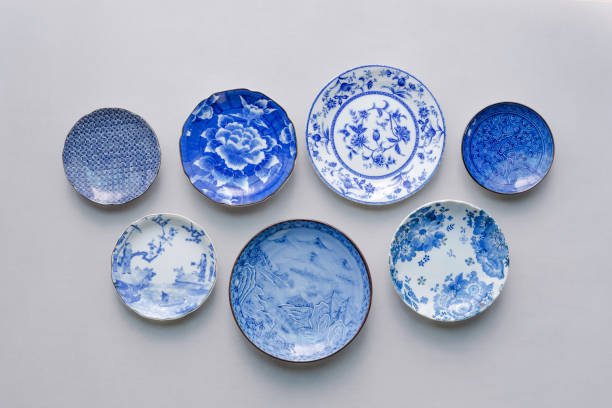 istock Set of ceramic dishes on table background. Top view 1086131730