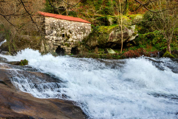 istock Old water mill in Barosa waterfall 1086142122