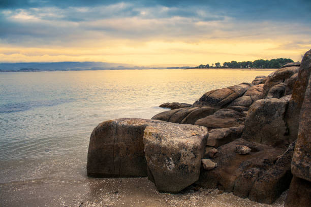 istock Coastal rocks at dawn 1086142124