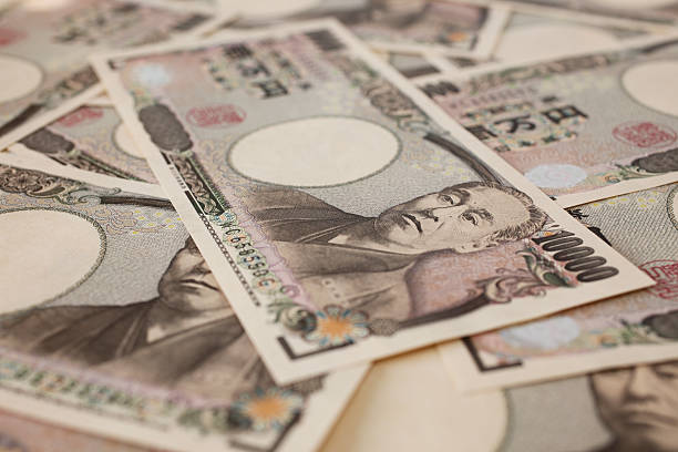 close-up of 10,000 japanese yen bills - japanse valuta stockfoto's en -beelden