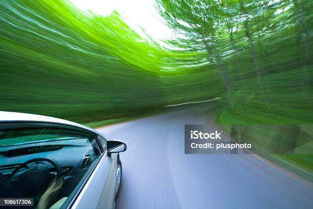 Car Driving Fast Into Forest Stock Photo - Download Image Now - Abstract, Asphalt, Car