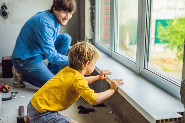 Father and son repair windows together. Repair the house yourself Father and son repair windows together. Repair the house yourself. 1354 stock pictures, royalty-free photos & images