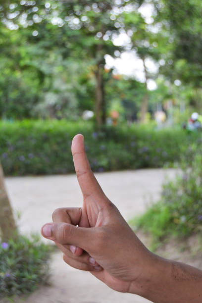 istock One finger on the park 1086186758