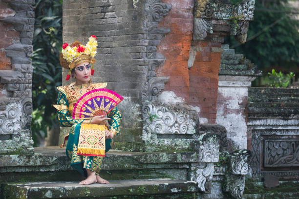 istock balinese legong dancer in traditional outfit 1086188764