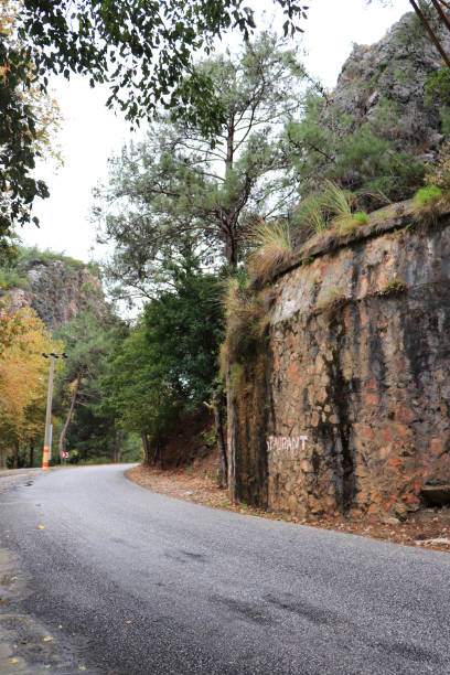 istock Mountain road with rock fall protection 1086191530