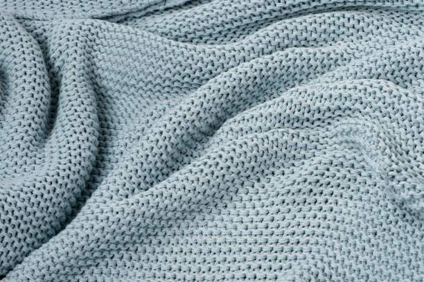 blue knitted plaid close-up textured background