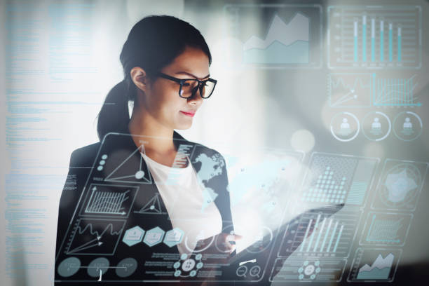 istock young business woman working in office with tablet 1086208762