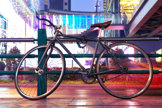 istock Bicycle park on footpath with street traffic background 1086219796