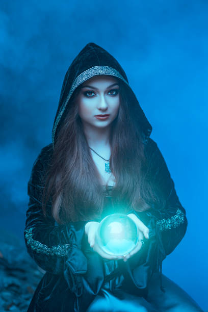 istock The witch with magic ball in her hands causes a spirits 1086224148