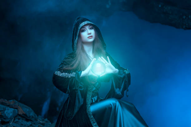 istock The witch with magic ball in her hands causes a spirits 1086224160
